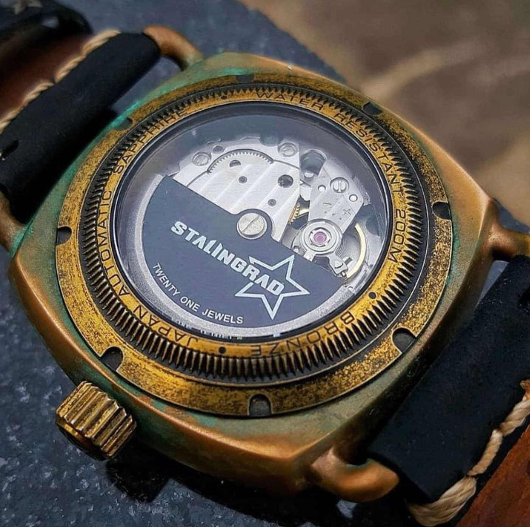 Bronze Watch display caseback showing automatic miyota movement and patina 