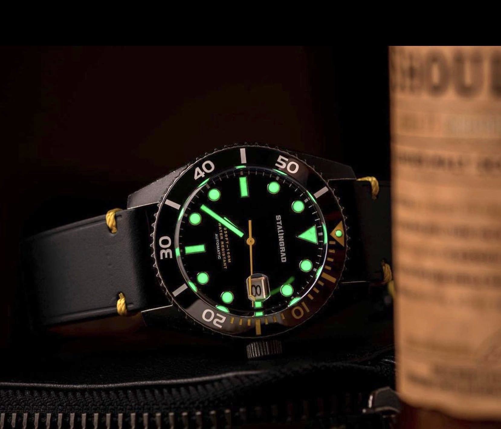Stalingrad Volga Defender black dial and leather strap at night with Lume