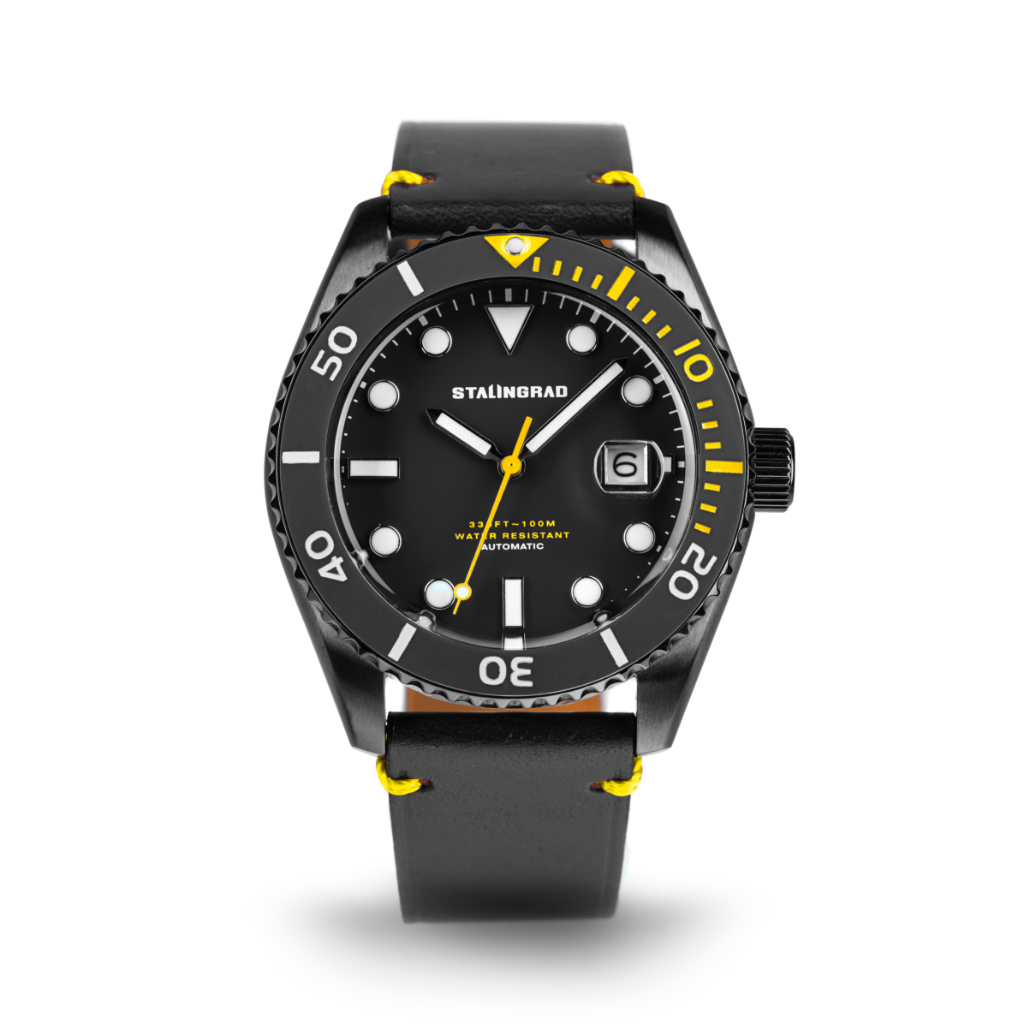 Stalingrad Volga defender automatic watch with a black case and black dial with yellow second hand in a black leather strap, front view or watch on a white background